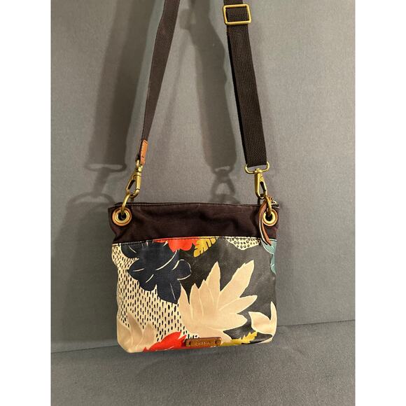 Fossil Vinyl covered canvas tropical print Keely bucket bag crossbody - Picture 1 of 9